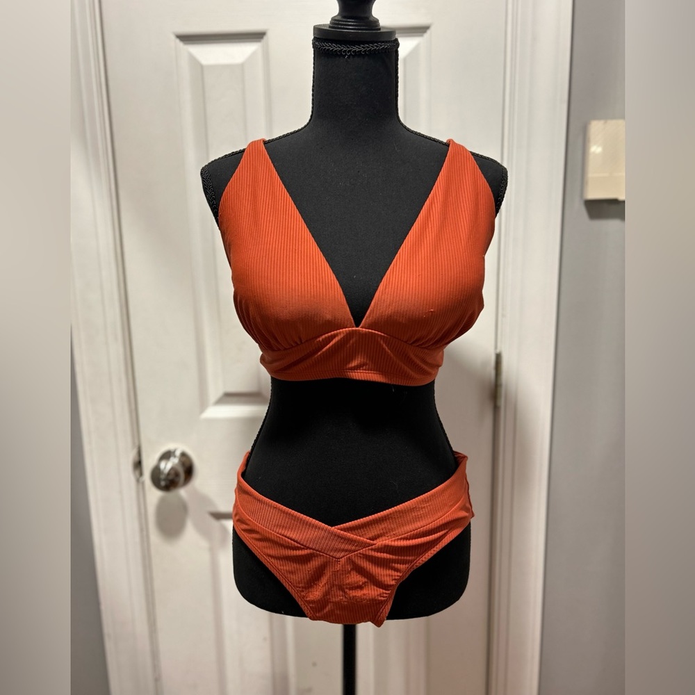 Orange Bikini with bigger top and smaller bottom